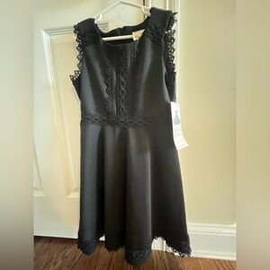 Black girls dress size 10 from rare edition never worn.